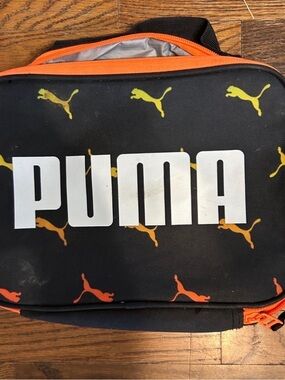 Puma Black Toiletry Bag with Orange and Yellow Puma Motifs
